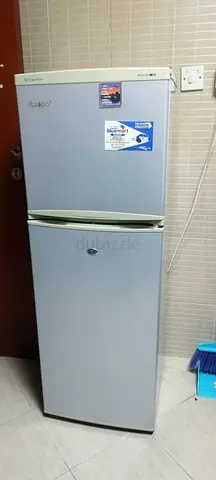 Compact Whirlpool Top-Freezer Refrigerator - Good Working Condition