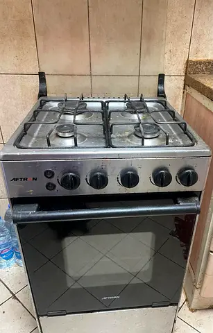 4-burner Gas Stove with Oven - Used, Working