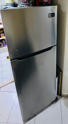 Silver double-door refrigerator (top freezer) - good condition