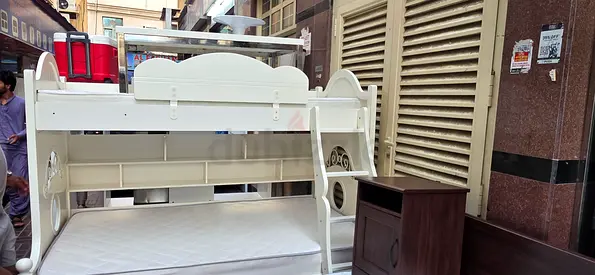 White wooden bunk bed with ladder and mattress - good condition