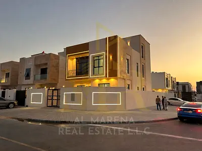 Luxury corner villa for sale in Al Zahia 1 – Ajman | 6 master bedrooms | Ground + First + Roof | On two paved streets | Area 3,307 sq ft | Luxury fini