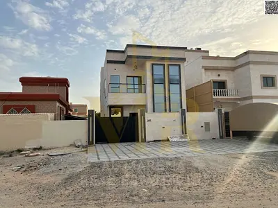 Villa for sale next to Ajman Academy, Al Muwaihat 2. Luxury, prime location, and ideal spaces for family living. Freehold ownership for all nationalit