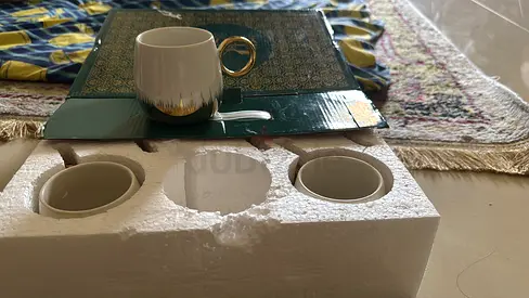 Set of 6porcelain coffee cups with gold handles, and idli maker