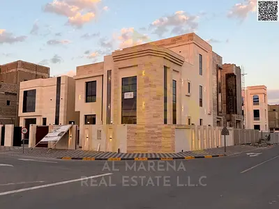 Luxury corner villa with 5 bedrooms and a roof terrace, including registration and ownership fees, in Al Zahiyah area, Ajman. Freehold ownership for a