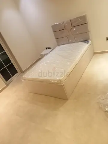 Single bed frame with headboard and mattress — like new