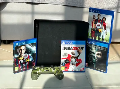 PlayStation 4 Slim with controller + 5 PS4 games (FIFA14, FIFA15, NBA 2K19, Dishonored 2) 1 TB