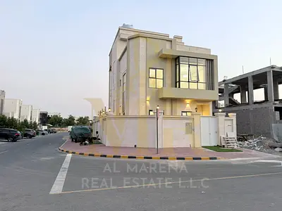 Corner villa for sale in Al Zahia | 6 master bedrooms + roof terrace | Land area 2,150 ft² | Built-up area 3,690 ft² | Majlis, living room, and kitche