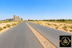 Residential and commercial plot (G+15) on Sheikh Mohammed bin Zayed Street, with a valid building pe