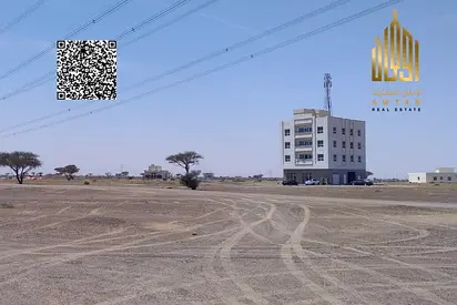 Corner plot of land for sale in Manama 15