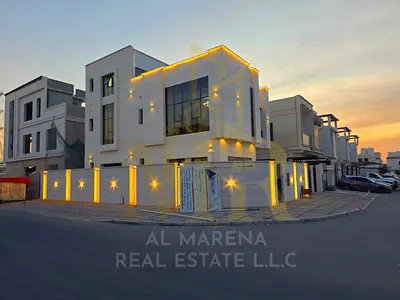 A distinctive villa in Al Yasmeen area - Ajman, two floors + roof, strategic corner location, including water, electricity, and air conditioning.