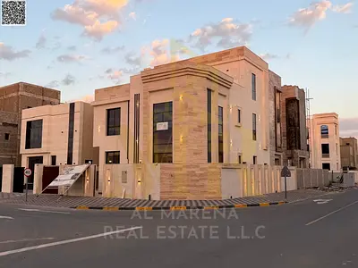 Luxury villa for sale in Al Zahia, Ajman | Two floors + roof | 7 master bedrooms | Land area 3,500 sq ft | Luxurious design and high-end finishes | El
