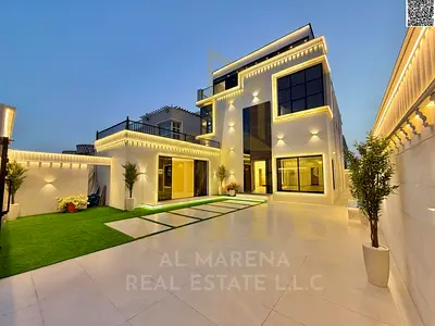 Luxury villa in Al Rawda - freehold, two floors and a roof, including electricity, water and air conditioning, prime location and high-end finishing,