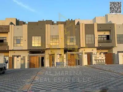 Two-story villa with a roof terrace and outdoor setback, located on a main street. Price includes registration fees, electricity, and water.