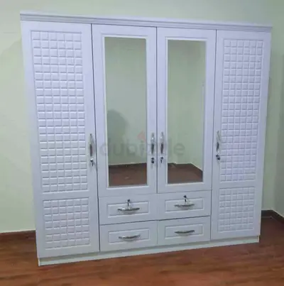 Spacious White 4-Door Wardrobe with Mirrors and Drawers