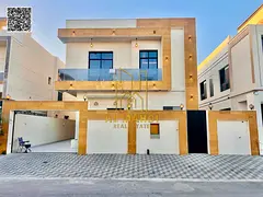 Luxury villa with a stone facade and modern design for sale in Al Yasmin, Ajman. Strategic location