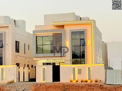 Villa (with pool) for sale in Ajman | Al Zahiyah area | 5 bedrooms, majlis, 2 living rooms, maid's room, and roof terrace | Freehold | Price includes