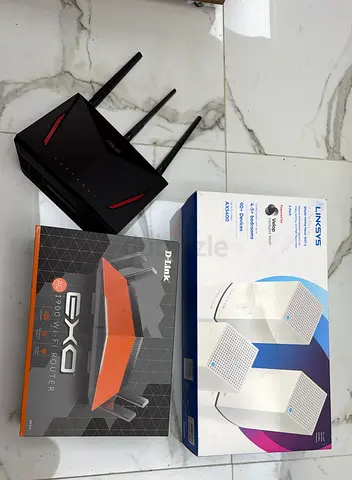 2 Routers+ Linksys Mesh System 3 Nodes (boxes included) - Good working condition