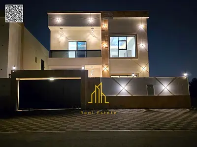 A distinctive villa for sale in Al Helio 2, Ajman, including registration and ownership fees. Close to services. Super deluxe finishing.