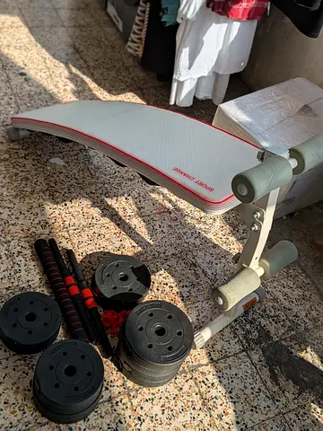 Adjustable Ab Bench with Weight Plates and Curl Bar - Good Condition