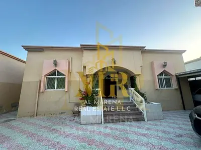 Villa for sale in Al Muwaihat 1 - Ajman | 5000 sq ft, 5 bedrooms, price includes electricity, water, and air conditioning.