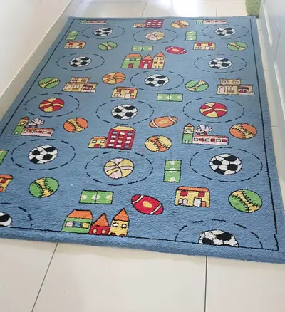 Light blue kids playroom rug with sports and city print - EXCELLENT condition