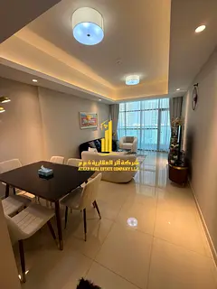 Luxury apartment, second occupancy, one bedroom and living room with balcony, gym, and swimming pool