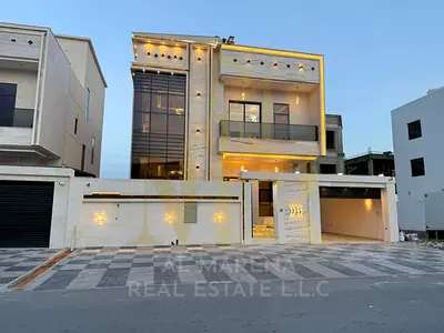 Modern villa in Al Amrah, Ajman. High-end finishing, electricity and water included. Freehold ownership, inheritable by children.