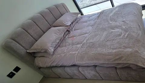 Modern Upholstered Bed with Fluted Headboard