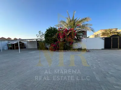 Villa in Rawda 2, 10,000 sq ft, strategically located near Sheikh Ammar Street, price includes electricity, water, and air conditioning.
