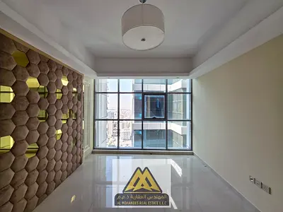For sale: Two bedrooms and a large living room in Gulf Towers Rashidiya 1 close to all services and main roads with gym, swimming pool, and parking