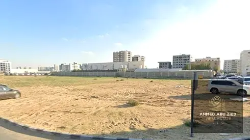 Prime Residential Commercial Plot for Sale in Al Jurf Industrial 3, Ajman with a corner location on two streets, 9,689 sq. ft. area, G+8 permit, offer