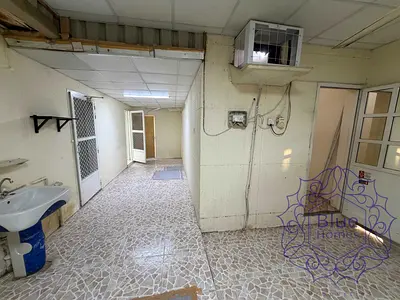 Monthly rent 2700aed 2 rooms hall open kitchen shairing in villa