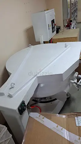 Spoon polishing machine