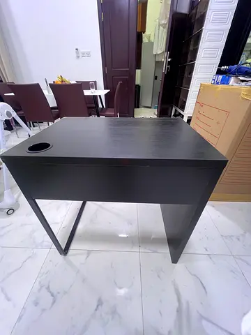 Compact black study/office desk with cable grommet