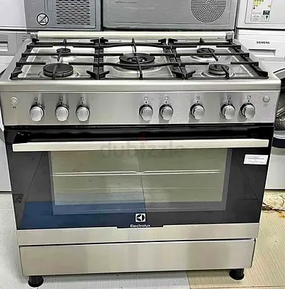 Electrolux new model full gas cooker 5 burner .oven with fan 90 cm for sale