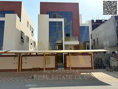 Luxury villa for sale in Al-Talla, with elevator, two floors, and a rooftop terrace, featuring an exceptional design and complete with air conditionin