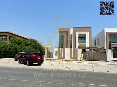 Villa for sale in Al Muwaihat 3 - Ajman | 5 master bedrooms | Area 5,100 sq ft | Price includes air conditioning.