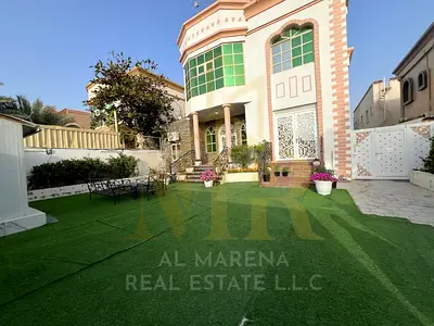 Villa for sale in Rawda 2, 5000 sq ft, 5 master bedrooms, living room, majlis, maid's room, large kitchen, and external annex. Price includes electric