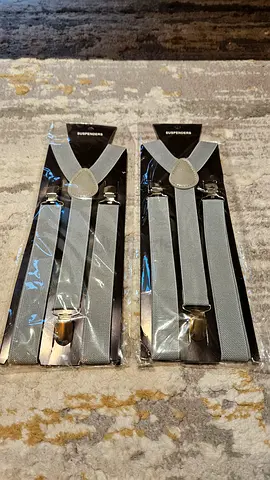 Pair of light grey mens suspenders (new, unused)