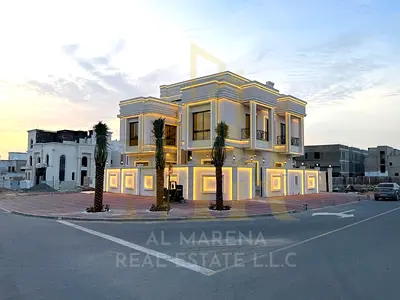 Luxury classic villa for sale in Al Helio 2, Ajman | 6 master bedrooms + roof + swimming pool | Corner opposite a garden | 5000 sq ft built-up area |