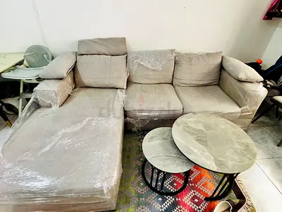 L shape sofa set beige color and coffee table