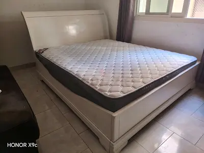 White wooden sleigh bed with mattress - King (used)