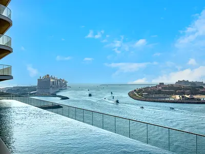 Exclusive Beachfront 2 Bed with Pool & Palm View