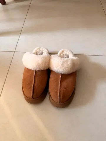 UGG Womens Disquette Slippers in a chestnut color featuring a thick, retro-style platform sole