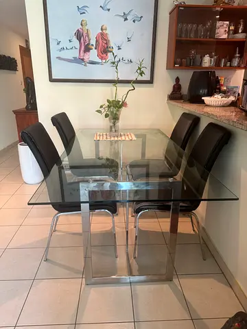 Glass Top Dining Table with 6 Black Leather Chairs - Good Condition