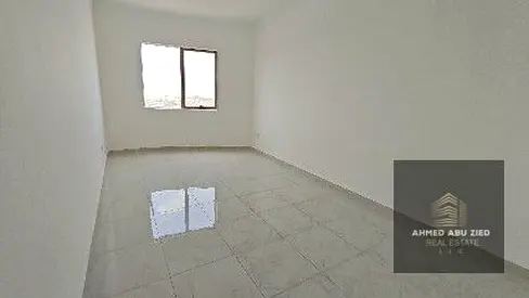 One bedroom and living room for sale in Sunset Tower, Al Alia area, Ajman, overlooking Sheikh Mohammed Bin Zayed Road. 1060 sq ft, with a convenient p