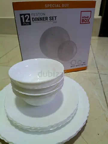 12-piece white porcelain dinner set - gently used