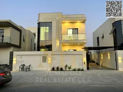 Villa on a street and alley, two floors, majlis and hall, directly from the owner, personal finishing, on a main street, close to all services, freeho