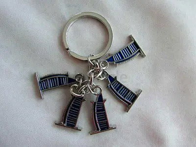 Metal keychain with five blue Burj Alarab