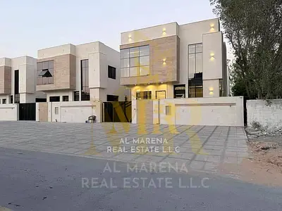 Luxury villa for sale in Al Bahia, Ajman. Registration and ownership fees, electricity and water connection fees included.